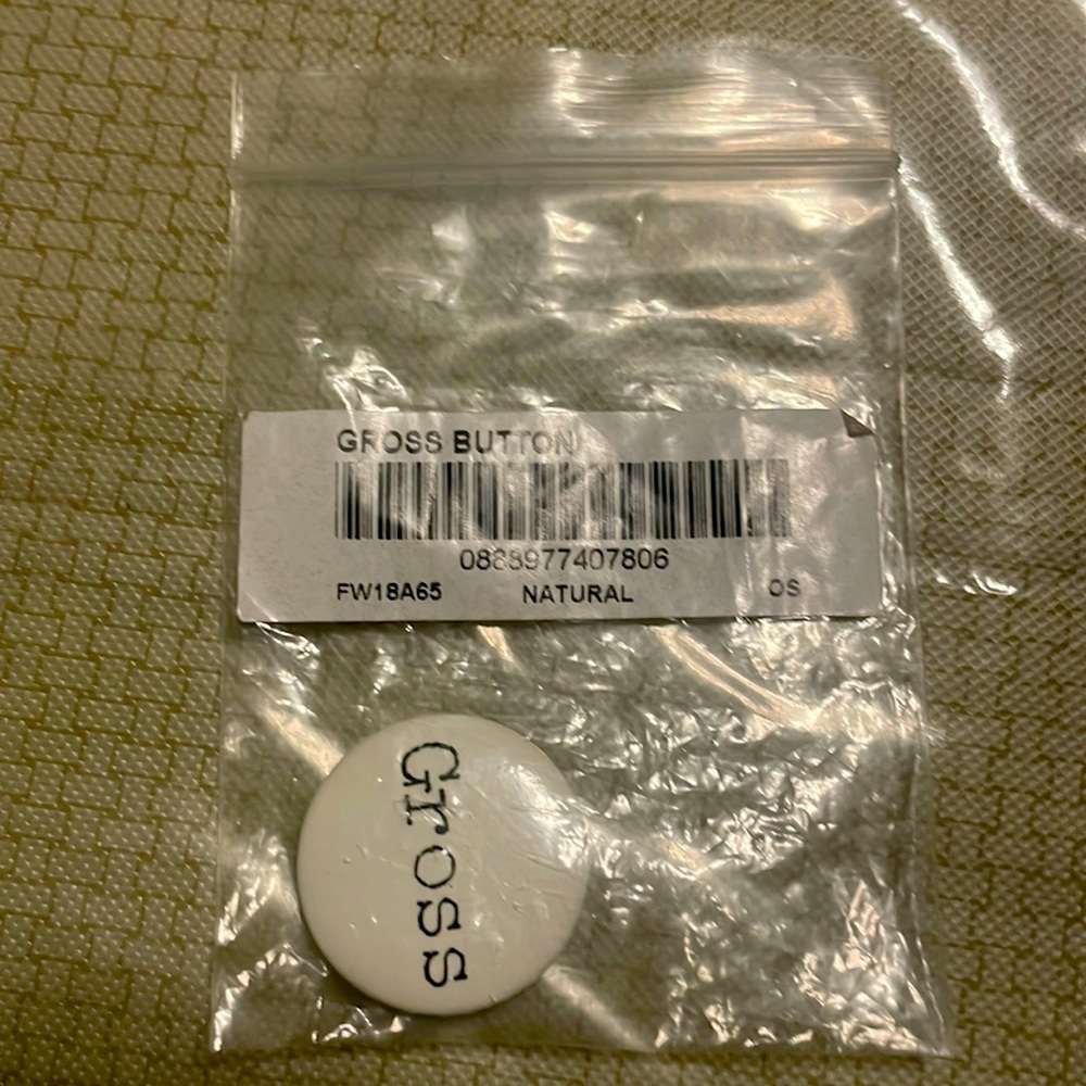 Supreme gross button